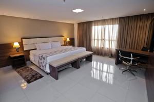 SJ Premium Hotels By Atlantica客房内的一张或多张床位