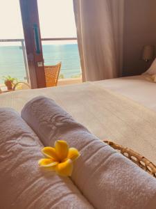Beach Eco Stays Hotel Boutique Lagoinha客房内的一张或多张床位