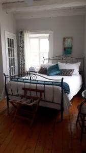 Auberge le Petit Séjour客房内的一张或多张床位