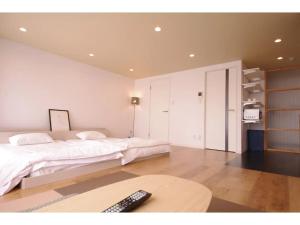 HOTEL APT SESELA - Vacation STAY 12881客房内的一张或多张床位