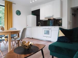 Apartament Nad Strumykiem z ogródkiem - Dream Apart的休息区