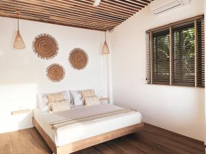 Mayara pool villas客房内的一张或多张床位