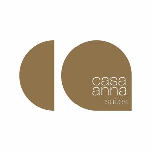 米克诺斯城Casa Anna Suites的casa amana套房标志标签