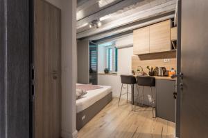 扎达尔蓝色旅馆的小型公寓 - 带床和厨房