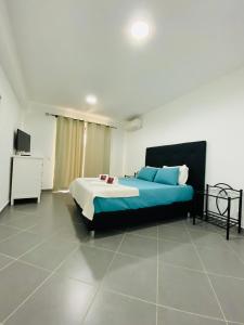 Apartamentos Poente da Aldeia客房内的一张或多张床位