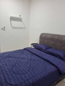 Modern 4BR Double Storey @ Setia Alam客房内的一张或多张床位