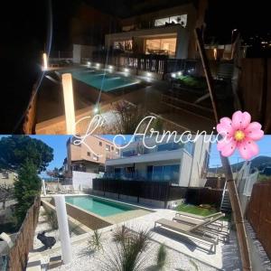 兰卡L'ARMONIA entre la Farella i Cau del LLOP的一座带游泳池和粉红色花的房屋