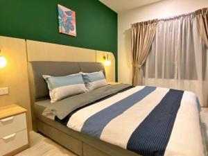 Suasana Suites【Modern 2B】 by SC Homestay客房内的一张或多张床位