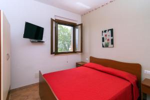 Costiera del Cilento Apartments客房内的一张或多张床位