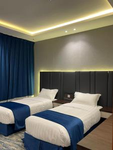 قمم بارك Qimam Park Hotel 2客房内的一张或多张床位