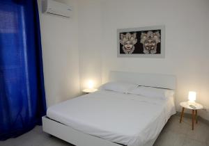 Ai Nidi del Borgo 1客房内的一张或多张床位