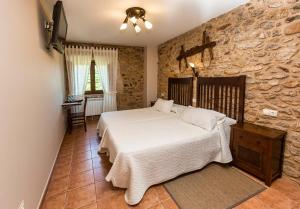 卡萨卡斯提内拉乡村民宿客房内的一张或多张床位