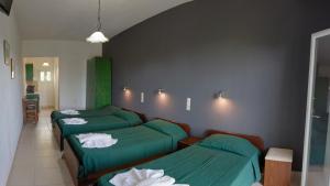 Habitat Villa Corfu客房内的一张或多张床位