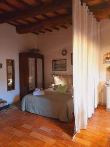 La Tana del Riccio客房内的一张或多张床位