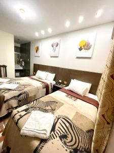 Hotel Suite Terrazzo客房内的一张或多张床位