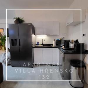 Apartment Villa Hřensko 132的厨房或小厨房