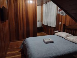 Casa do Trem Suítes客房内的一张或多张床位