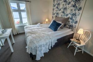 德拉斯维克峡湾酒店客房内的一张或多张床位