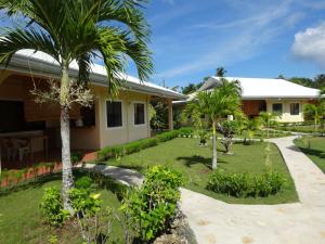 邦劳保和森塞德度假酒店的棕榈树庭院度假屋