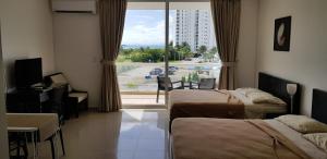 Playa Blanca Towncenter Suite - NO incluye comidas客房内的一张或多张床位