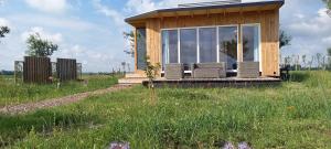 Tiny house het Polderhuisje外面的花园