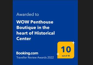 雅典WOW Penthouse Boutique in the heart of Historical Center的带有黄色盒子的网站的截图