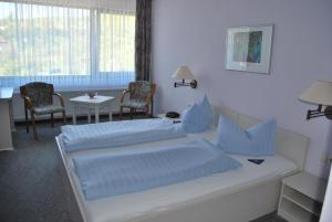 Hotel Stadt Witzenhausen客房内的一张或多张床位