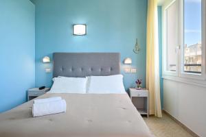 Amadei Hotel Promenade客房内的一张或多张床位