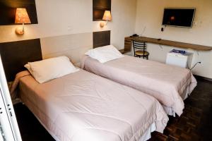 安汉盖瓦旅馆客房内的一张或多张床位
