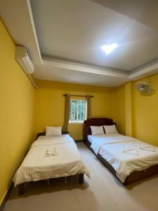 ISLANDS BOUTIQUE Koh Rong客房内的一张或多张床位