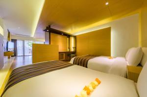 STANFORD Hotel & Resort Jeju客房内的一张或多张床位