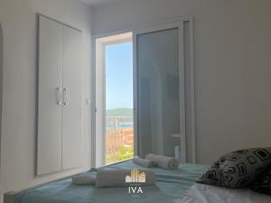 Apartmani IVA Bečići客房内的一张或多张床位