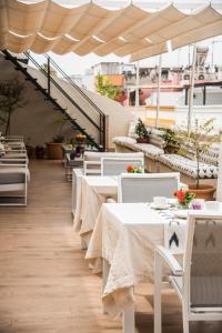 Jardin de la Alameda Hostal Boutique餐厅或其他用餐的地方