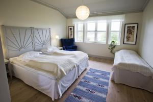 萨尔斯特姆斯加登酒店客房内的一张或多张床位