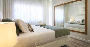 Hotel Campo do Rosmaninho客房内的一张或多张床位