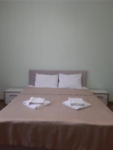 Готель Баронський Двір客房内的一张或多张床位