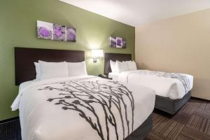 Sleep Inn Dallas Northwest - Irving客房内的一张或多张床位