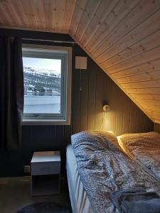 Senja arctic lodge客房内的一张或多张床位