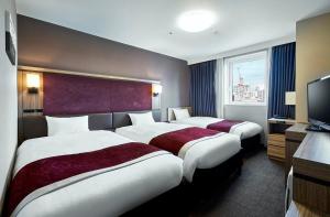 札幌薄野大和鲁内酒店客房内的一张或多张床位