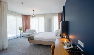 Wasa Resort Hotel, Apartments & SPA客房内的一张或多张床位