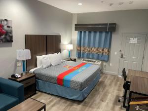 Haven Inn & Suites Downtown Houston.客房内的一张或多张床位