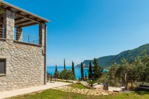 阿约斯尼奇塔斯Mylos Mountain Villas- Villa Giorgio的海景石屋