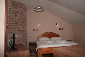 Guest House Zlatiborski Pastuv客房内的一张或多张床位