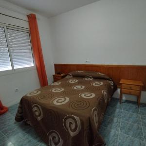 Villas Port Tropical客房内的一张或多张床位