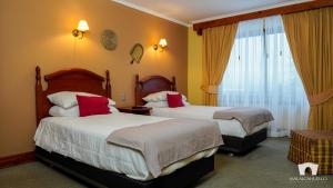 Malalcahuello Thermal Hotel & Spa客房内的一张或多张床位