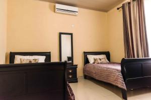 Lukonde - Kat-Onga Apartments客房内的一张或多张床位