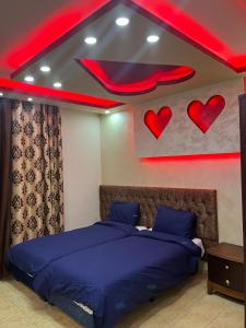 Shihan hotel suites客房内的一张或多张床位
