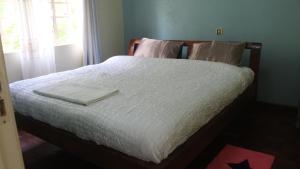 Tranquil Homestays客房内的一张或多张床位