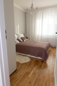 Apartamenty Termalne Dobry Klimat客房内的一张或多张床位