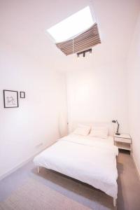 Great 2 Bedroom Serviced Apartment 69m2 -LH18-客房内的一张或多张床位